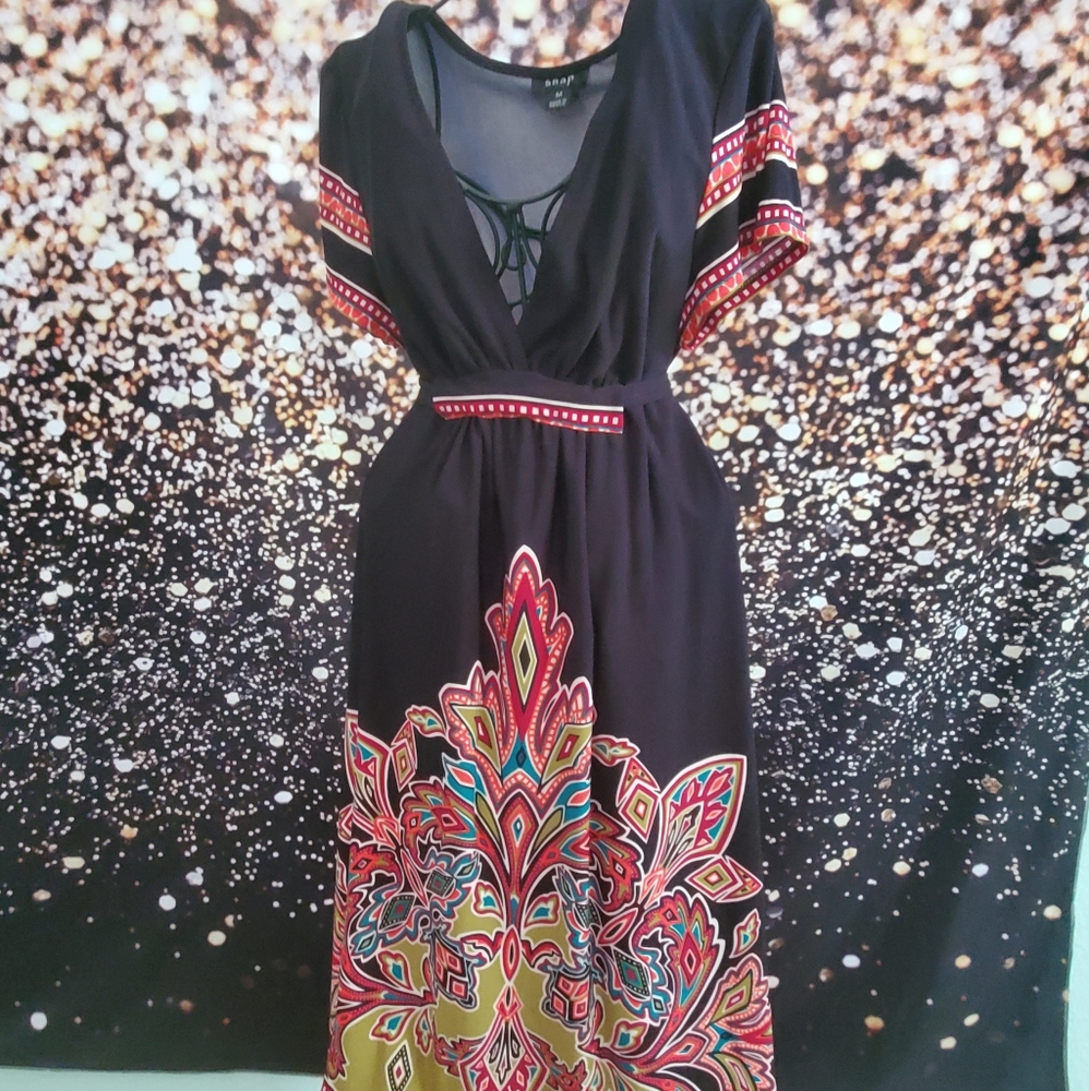 Snap black dress with colorful designs. Size M
